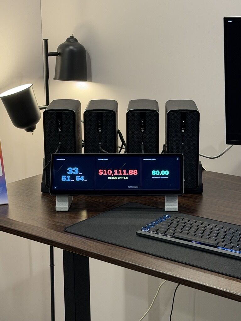 Four Corsair AI 300 workstations clustered on a desk at Computex 2026, with a display comparing cloud AI spend to local inference.